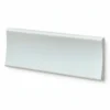 Two geometric shapes: a rounded triangular piece on the left and a rectangular piece on the right, both in light colors. Its Called EPS Plain Cornice 11mmx85mmx2m