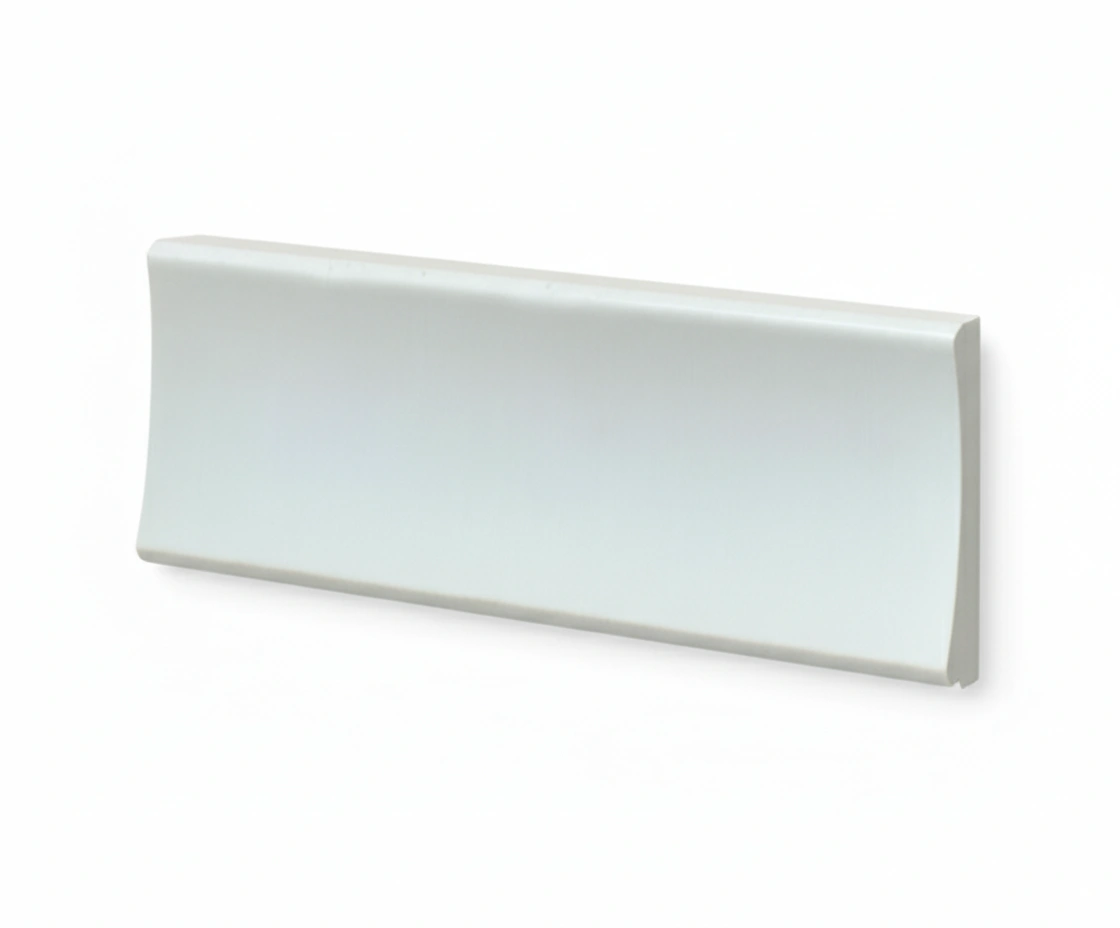 Two geometric shapes: a rounded triangular piece on the left and a rectangular piece on the right, both in light colors. Its Called EPS Plain Cornice 11mmx85mmx2m