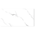 White marble surface with subtle gray veining, showcasing a smooth, elegant texture ideal for countertops or flooring. Its Called Ceramic Glossy Polished Wall Tiles Carrara