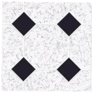 A tiled floor design featuring a textured white pattern with black diamond-shaped accents interspersed throughout. Its Called Paving Ceramic Matt Tiles