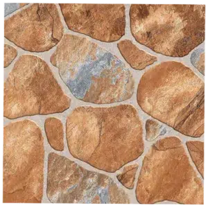 Close-up of a stone wall with an irregular pattern, featuring various shades of brown and hints of gray. The stones are unevenly shaped and mortared together, creating a rustic and natural appearance. Its A-Grade Paving Ceramic Matt Floor Tiles - 400x400mm